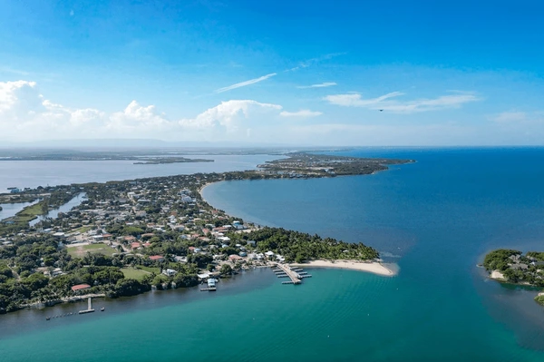 Aerial view of Belize coastline with turquoise waters and beaches