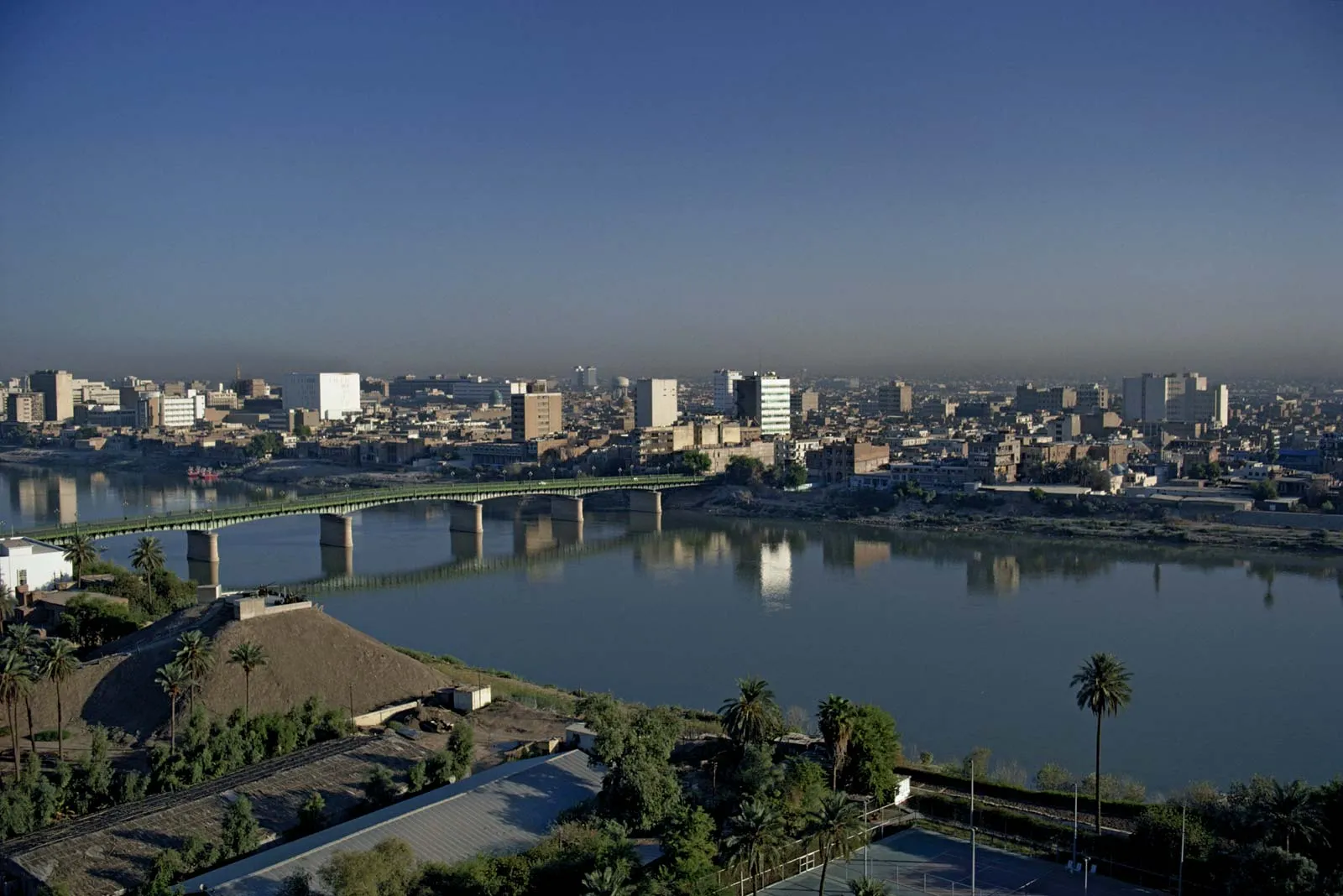 Baghdad skyline showing modern and traditional buildings