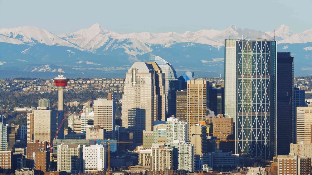 Calgary skyline with the Rocky Mountains in the background