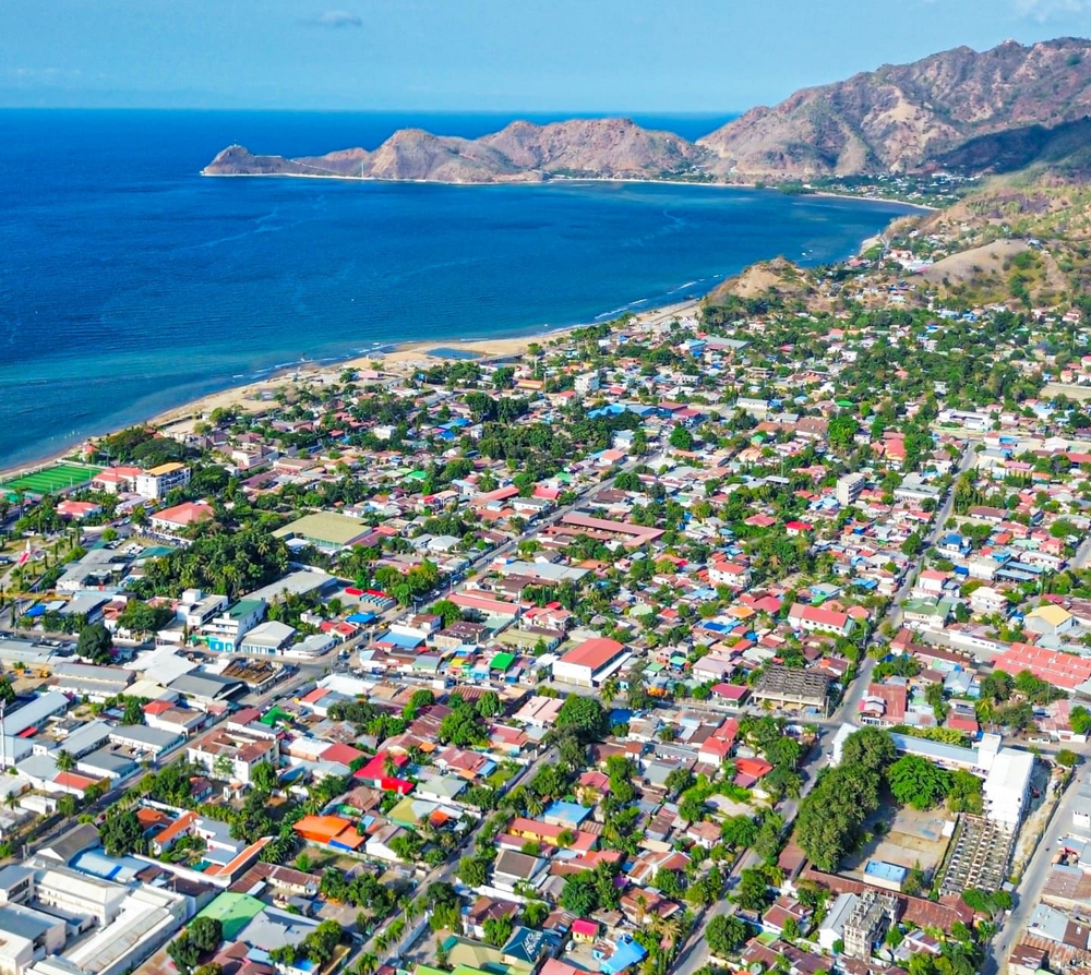 Dili waterfront with mountains in background