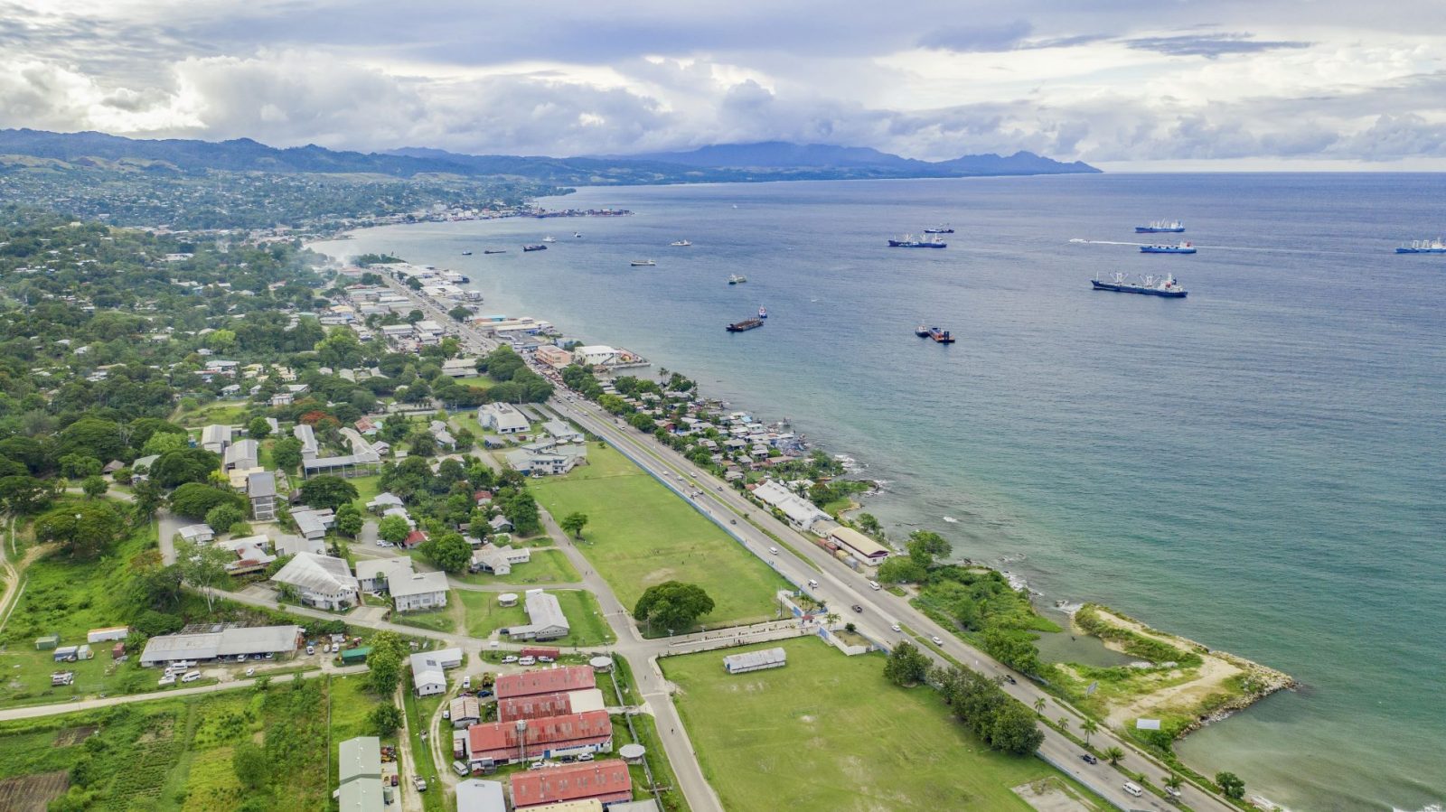 Solomon Islands coastline showing traditional and modern buildings