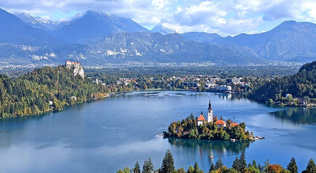Scenic view of Lake Bled with mountains and castle