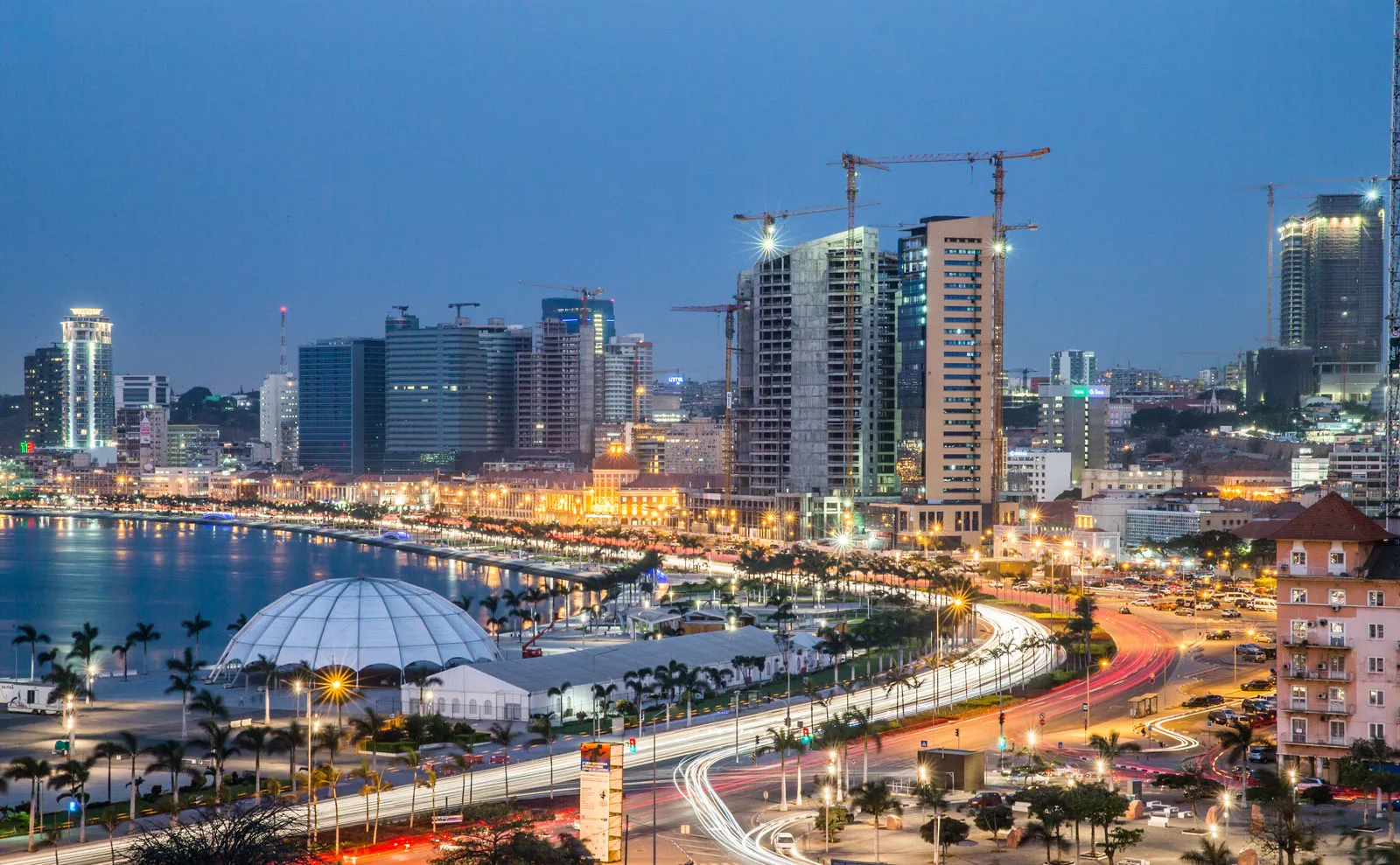 Luanda skyline showing modern buildings alongside developing areas