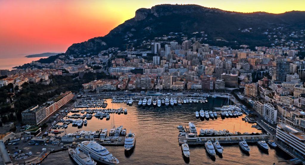 Monaco skyline and Port Hercule with luxury yachts