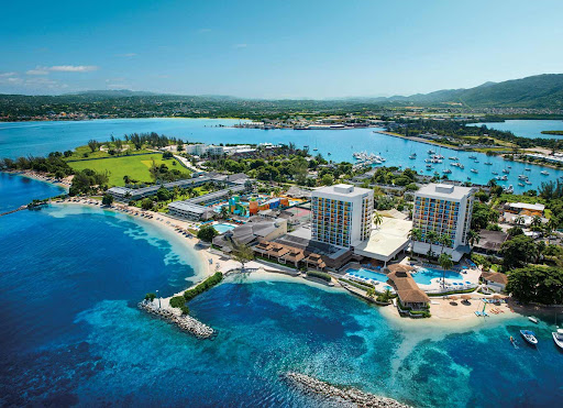 Jamaica's beautiful coastal landscape with blue waters and luxury properties
