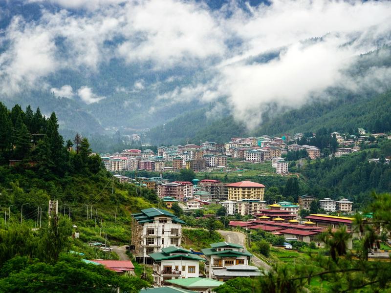 View of Thimphu city with traditional Bhutanese architecture and mountains