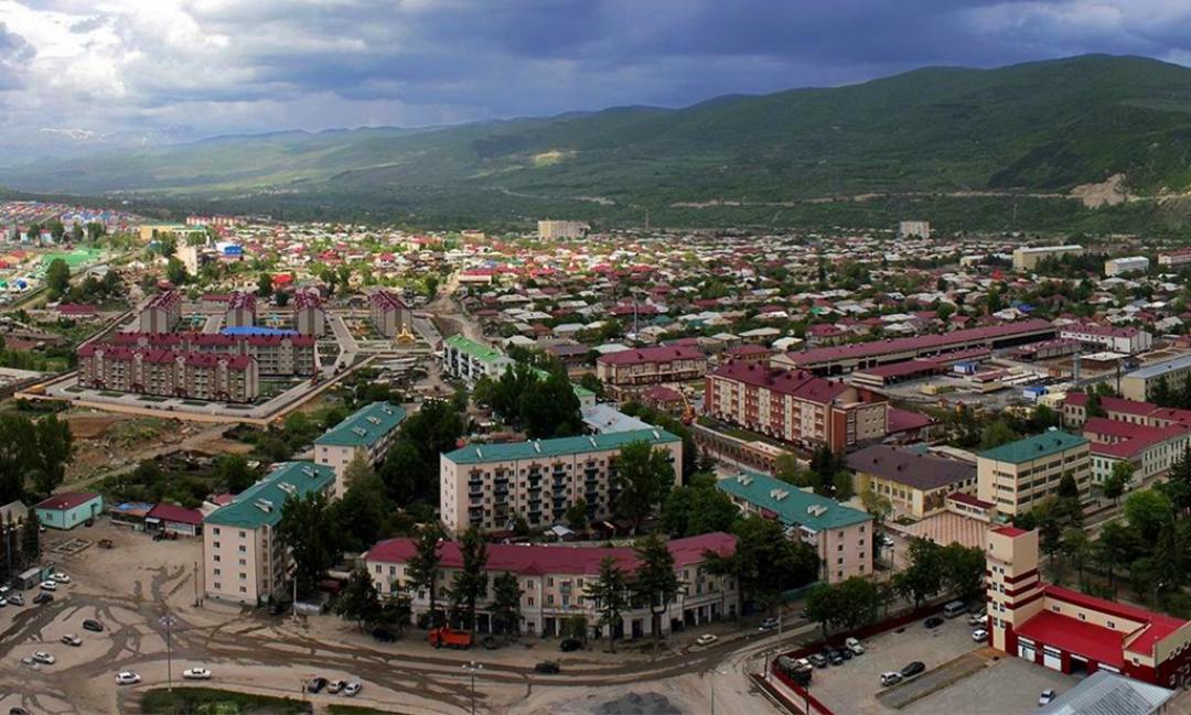 Tskhinvali cityscape with mountains in background