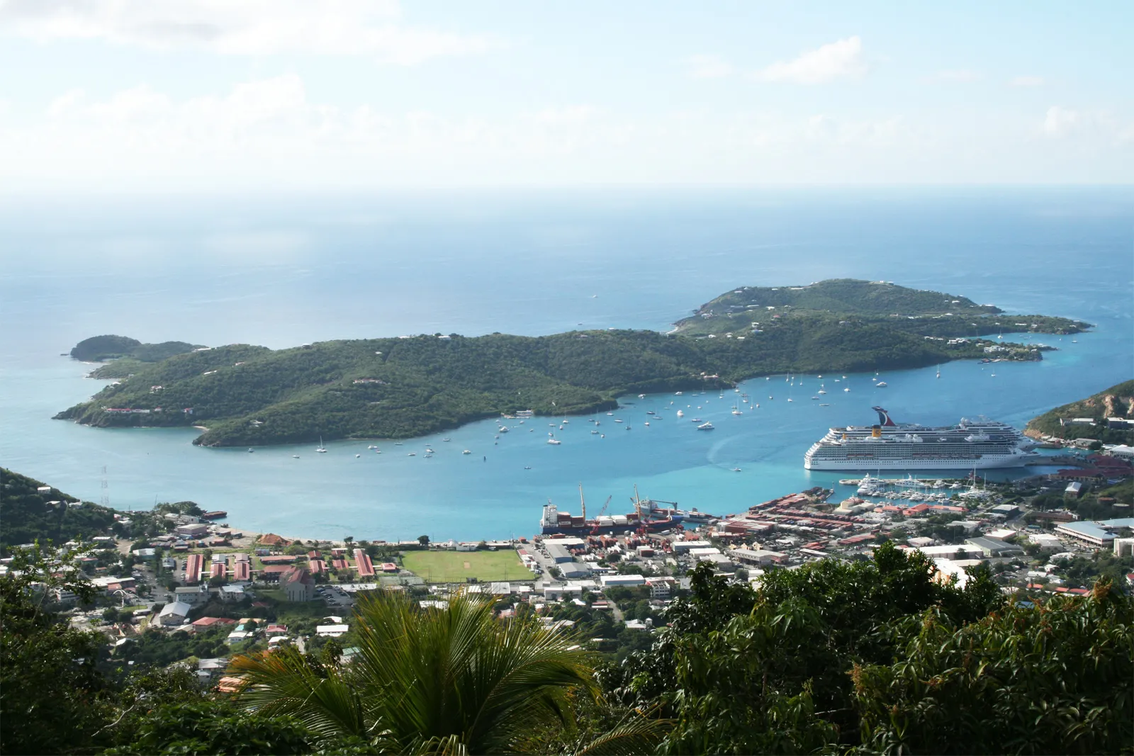 St. Thomas harbor with cruise ships and colorful buildings