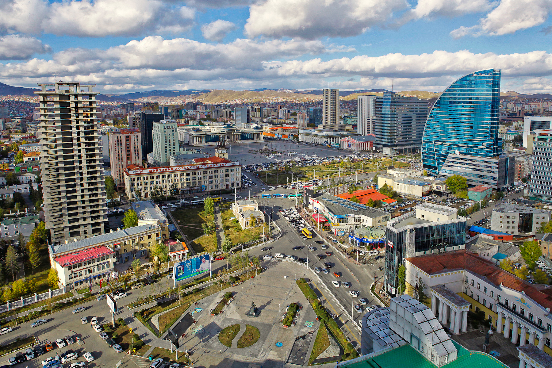 Ulaanbaatar skyline showing contrast of modern buildings against mountainous backdrop