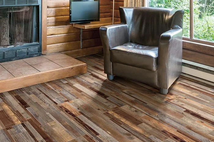Living room flooring installation example hardwood lvp tile carpet comparison cost per square foot subfloor leveling transitions neutral colors staging buyer appeal durable pet friendly waterproof