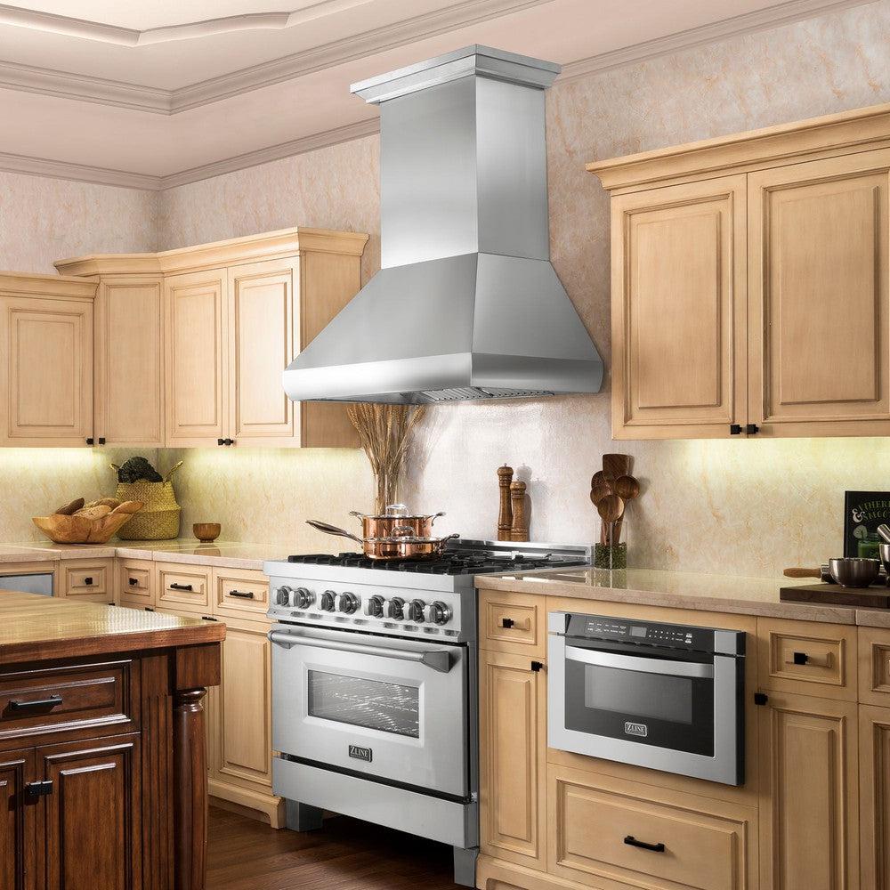 Professional range hood installation with stainless steel chimney style ducted ventilation and proper CFM rating