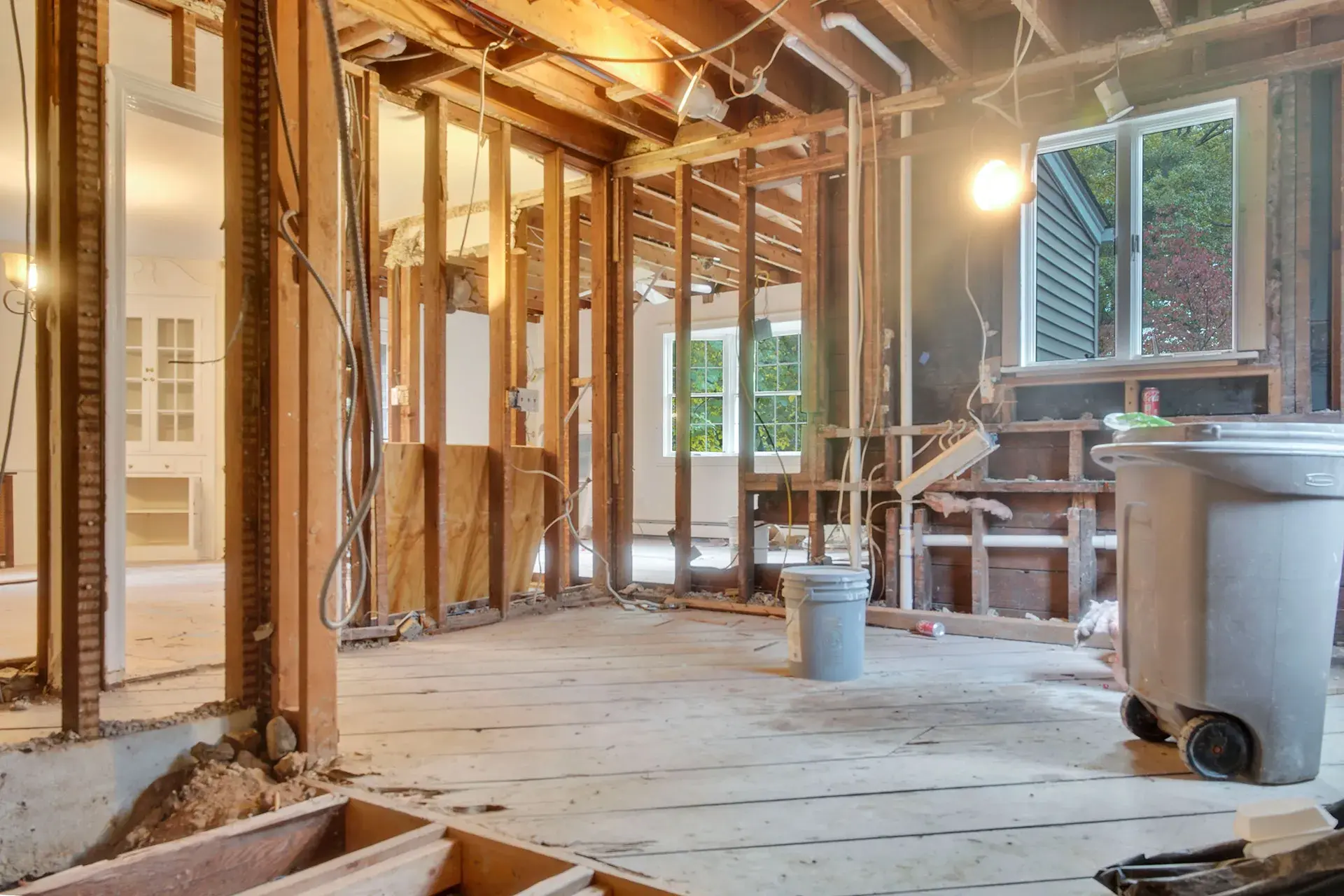 professional gut renovation down to studs home transformation demolition framing structural repairs new electrical plumbing hvac insulation drywall kitchen bathrooms finishes contractor permits inspections