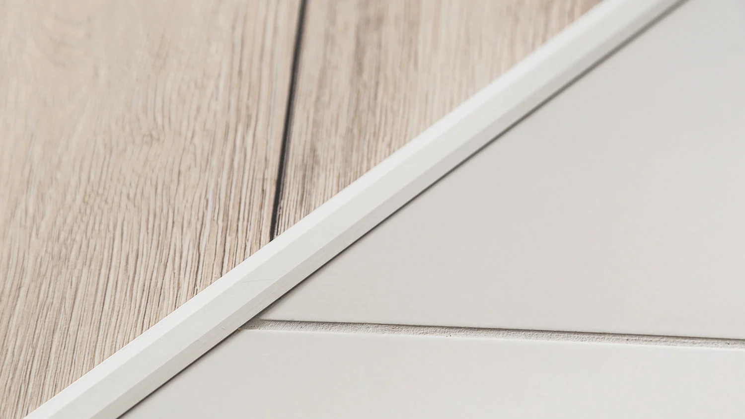 floor transition strips t-molding reducer threshold saddle stair nose end cap quarter round carpet bar metal transition doorway flooring height difference expansion gap