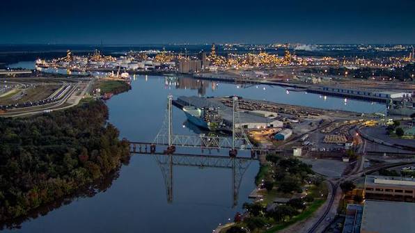 Beaumont Texas petrochemical skyline and Neches River
